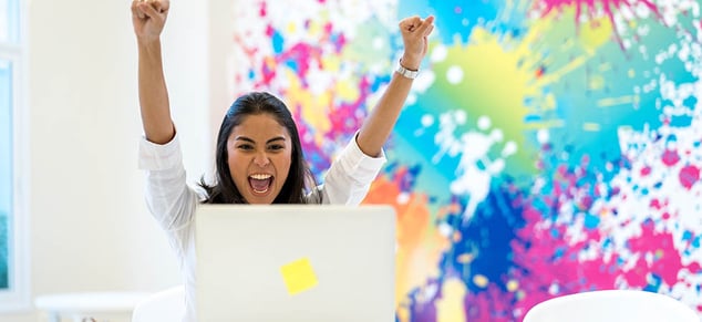 Excited Employee_Color Splotch Background_GettyImages_980x450