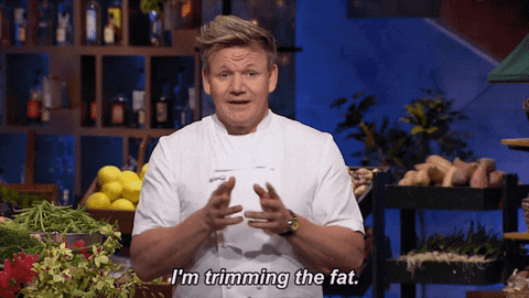 Chef Gordon Ramsey imitating scissors cutting with his hands