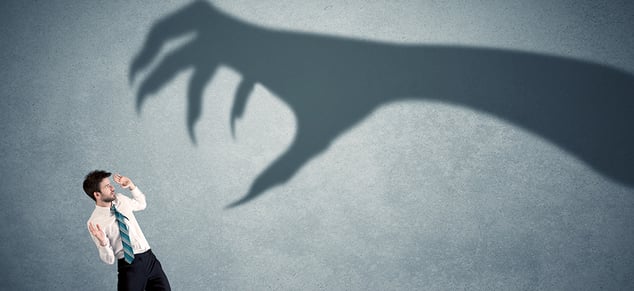 Man Scared of Shadow Clawed Hand_GettyImages_980x450