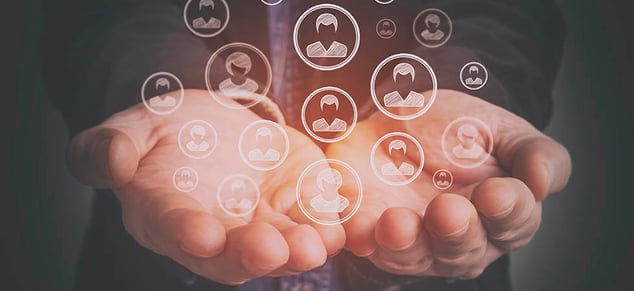 Man holding people icons_GettyImages_980x450